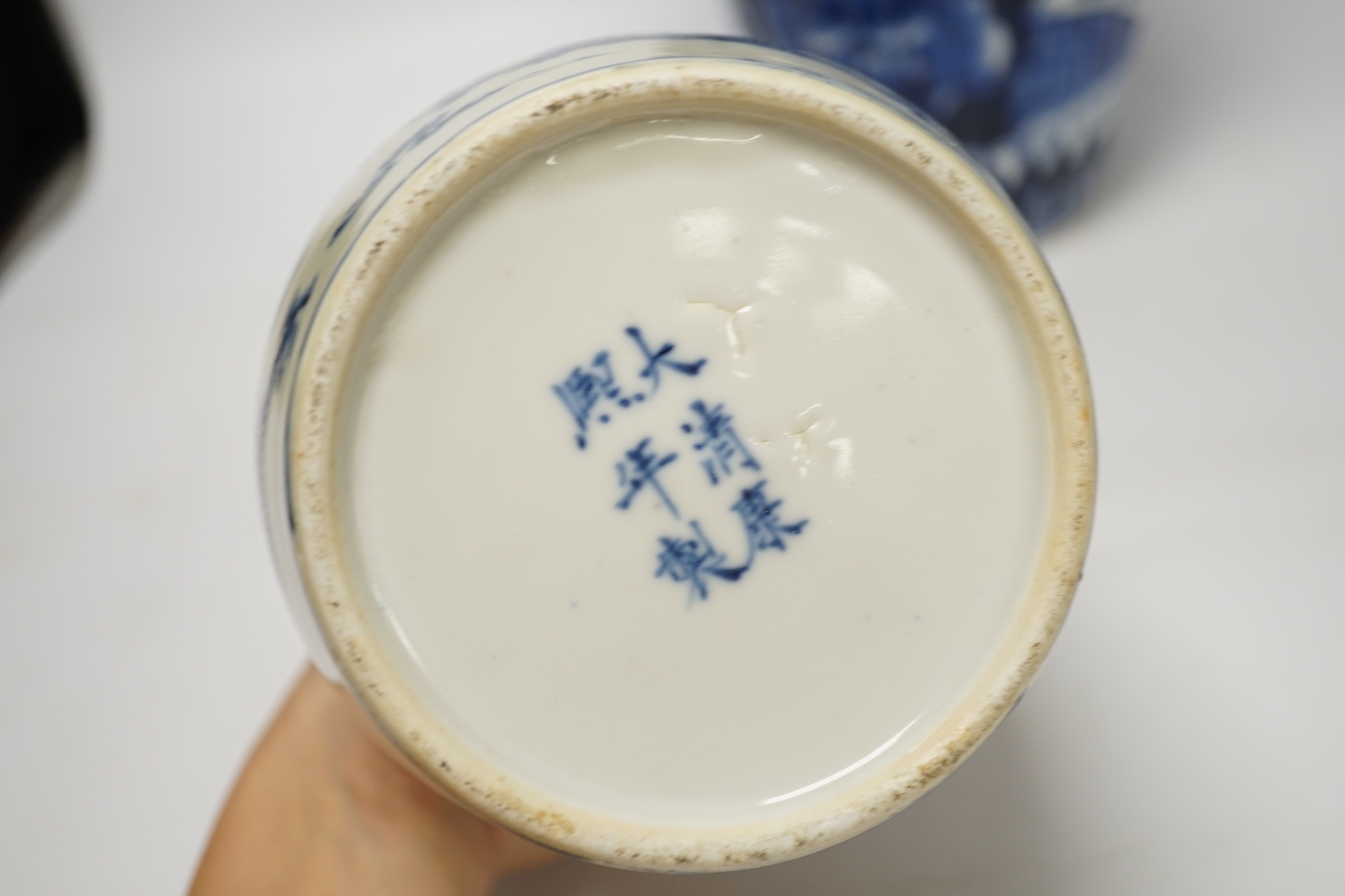 Three 19th century Chinese blue and white vases including a floral pair and a Japanese vase, largest 39cm high